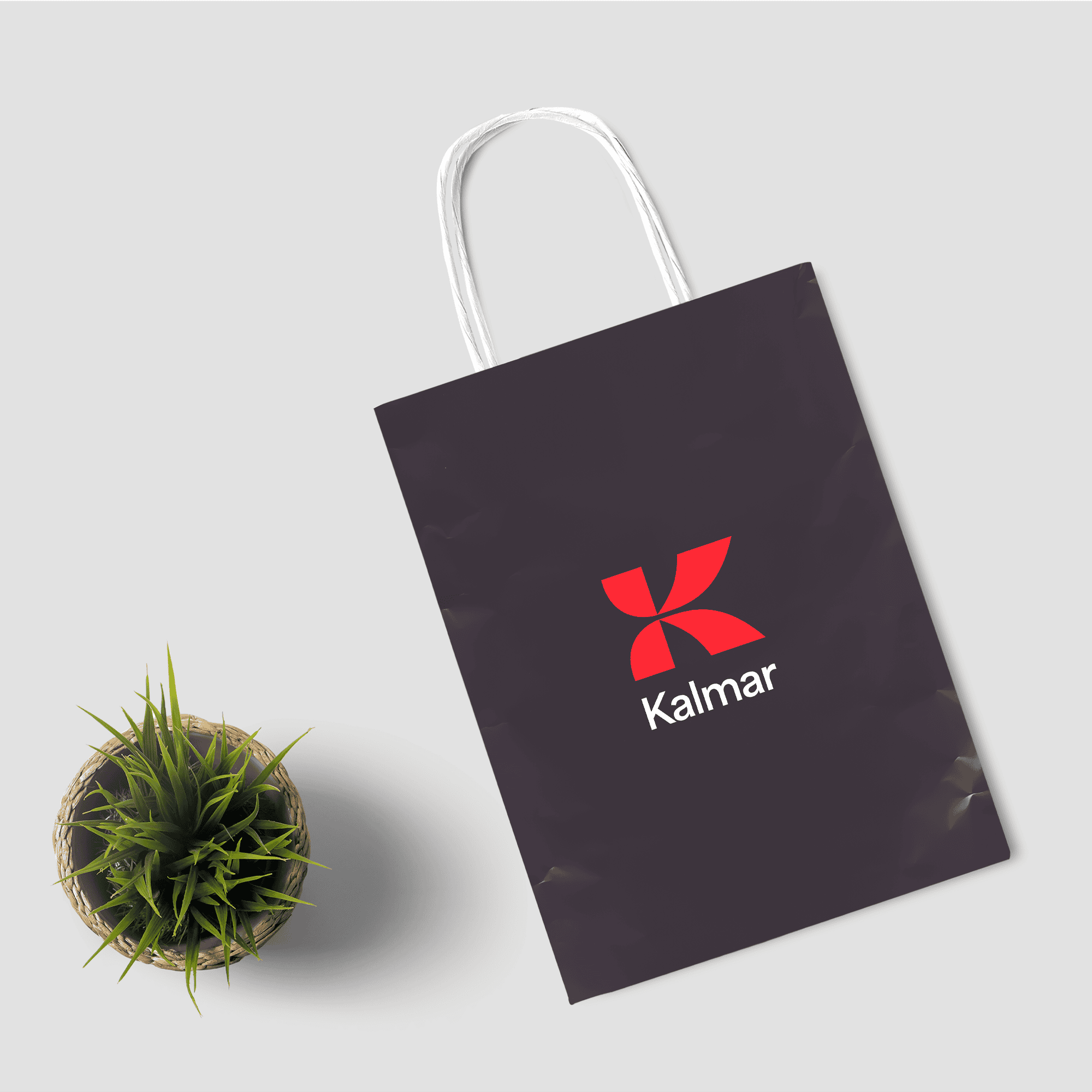 purple paper bag with kalmar logo from top