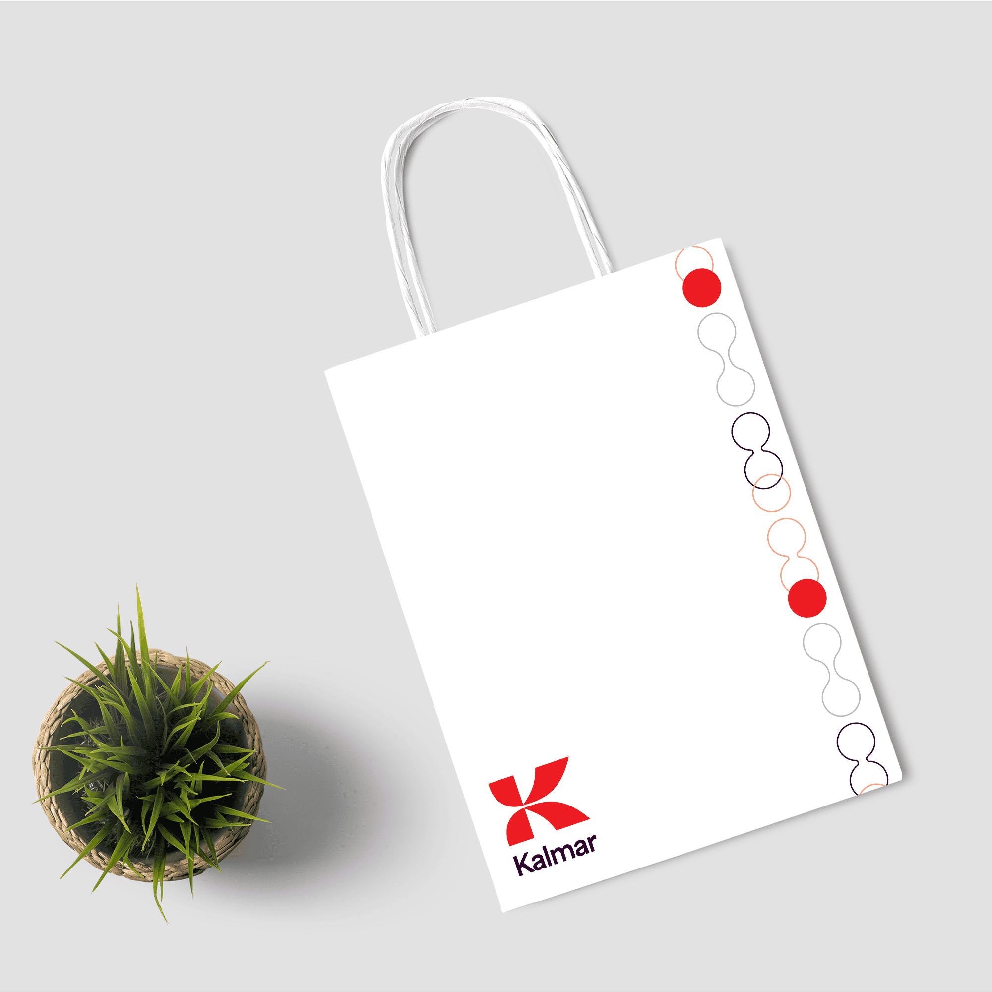 white paper bag with kalmar logo and pattern from top