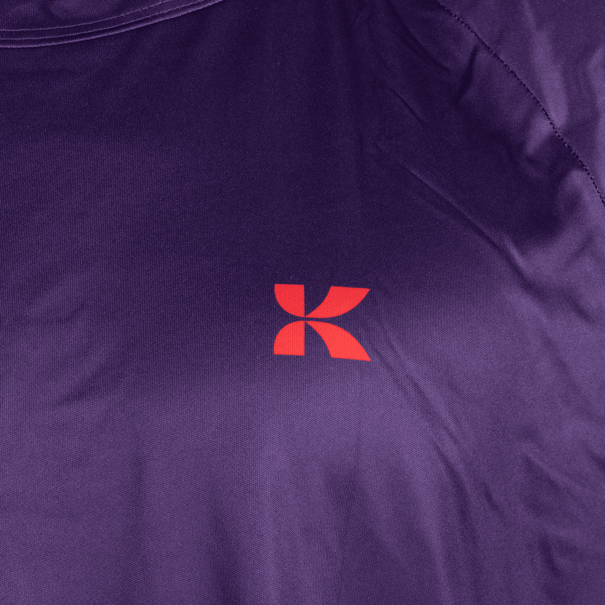 purple active tee with close up on logo